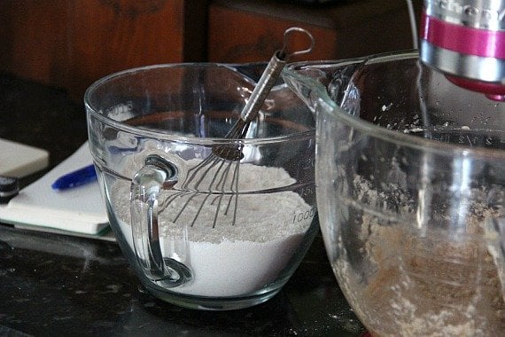 Two mixing bowls with dry and wet ingredients