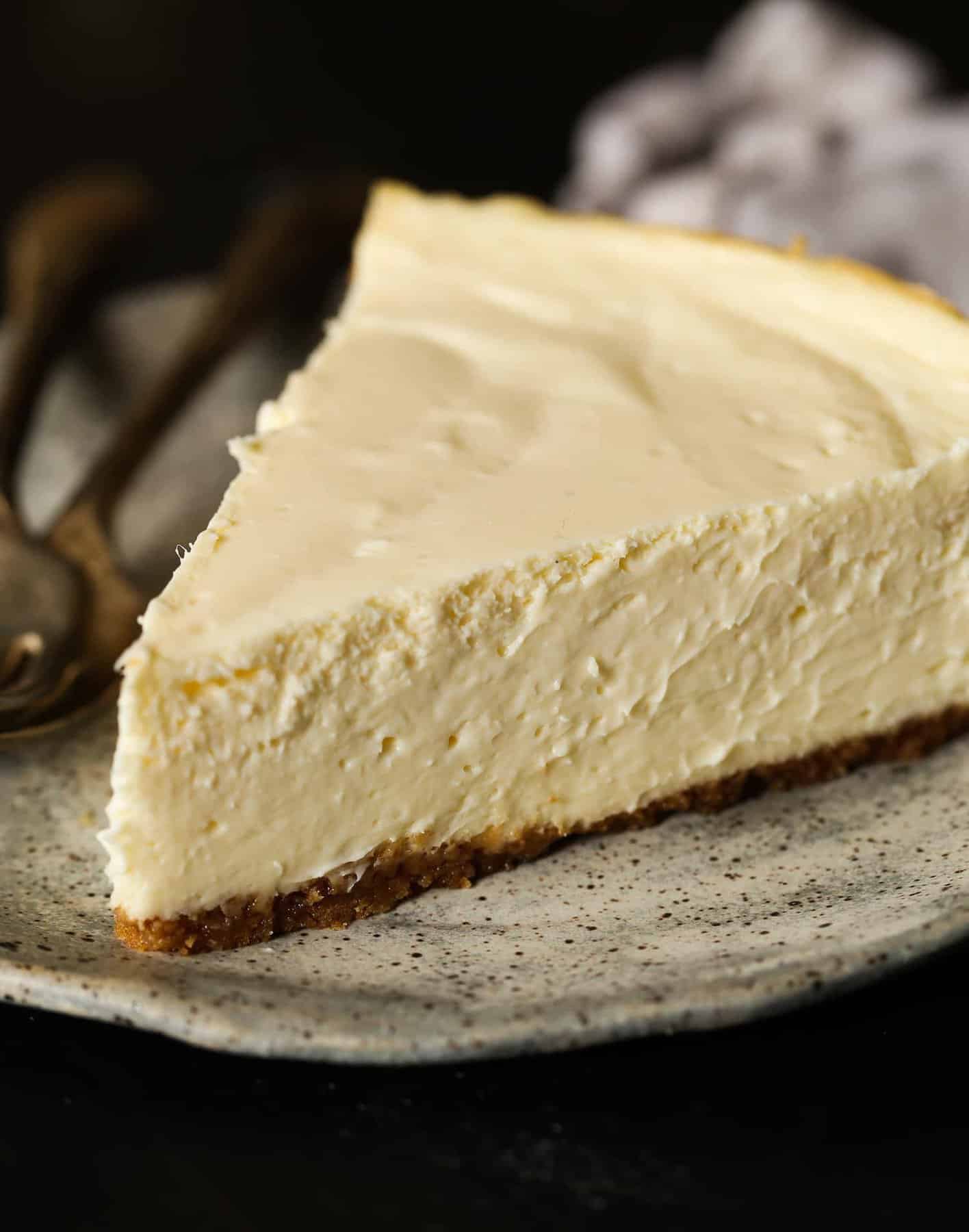 A slice of homemade cheesecake on a plate